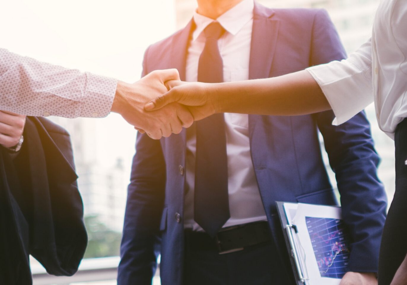 handshake of business People deal business. Hold hand and shaking hand in city